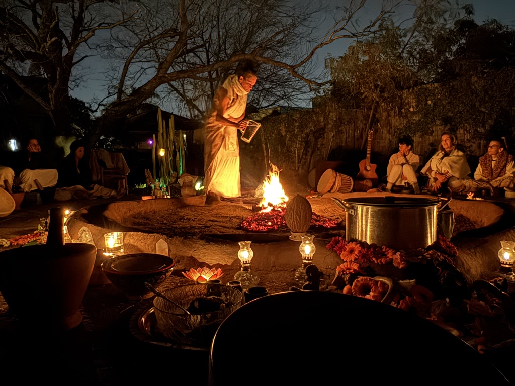 Women gathered around a ceremonial fire